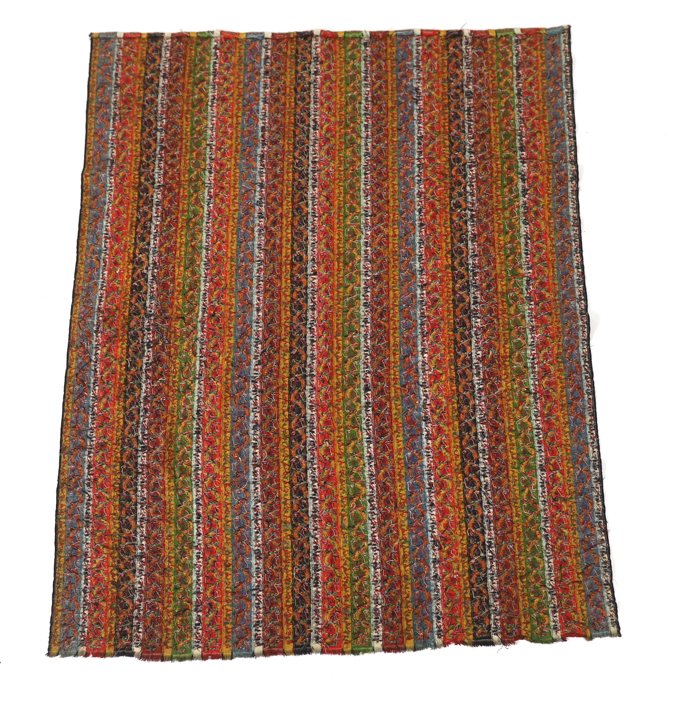 A 19th century Kashmir, multi coloured, striped twill, woven wool shawl, with the fringe cut one end, 140cm long x 114cm wide